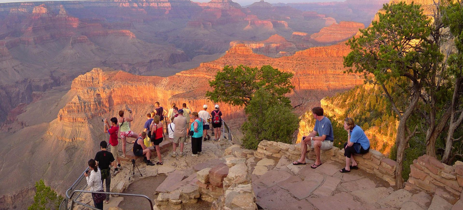 Visitors at grand canyon sunset tour viewpoint