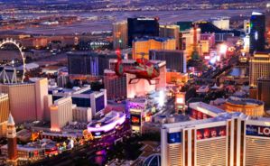 an aerial view of the glittering las vegas casinos and neon lights seen at night