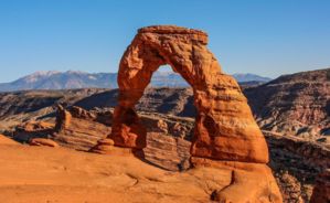 a stunning stone archway located within Arches National Park in Moab UT