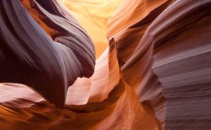 bright orange sandstone walls within antelope canyon in page arizona