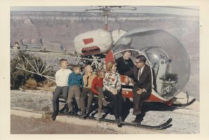 The Halvorson family stands at the Grand Canyon on a helicopter tour