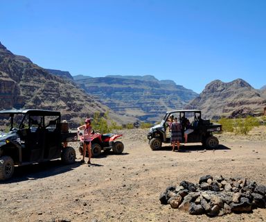 A visitor to Bar 10 Ranch rides an ATV en route to the Grand Canyon North