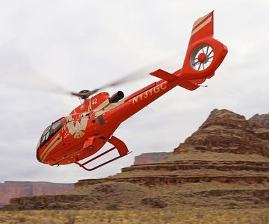 A helicopter provides transportation from the rim at Grand Canyon West down to the riverside boat dock.
