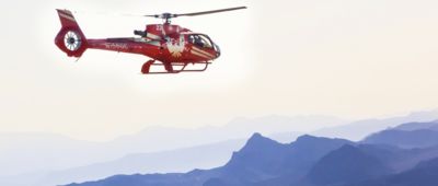 Private sunset tour First class EC130 helicopter in the air