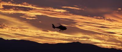 See the Sunset Helicopter illuminated by the setting sun