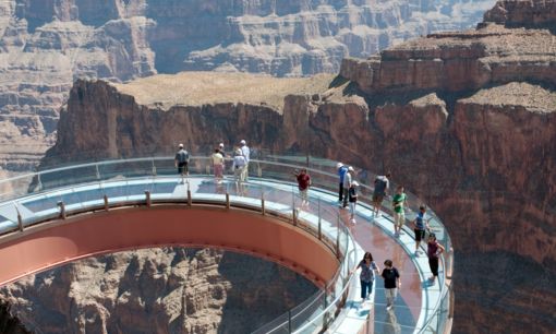 Walk the Skywalk at Grand Canyon West Guests on the glass bridge