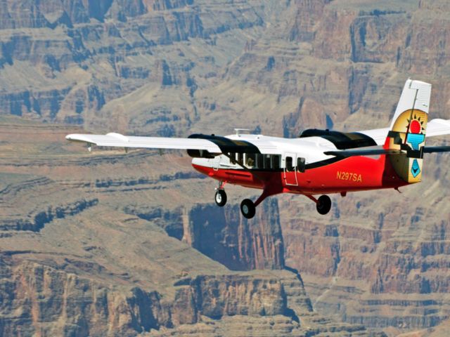 Twin Otter Vistaliner flying over the Grand Canyon West Rim