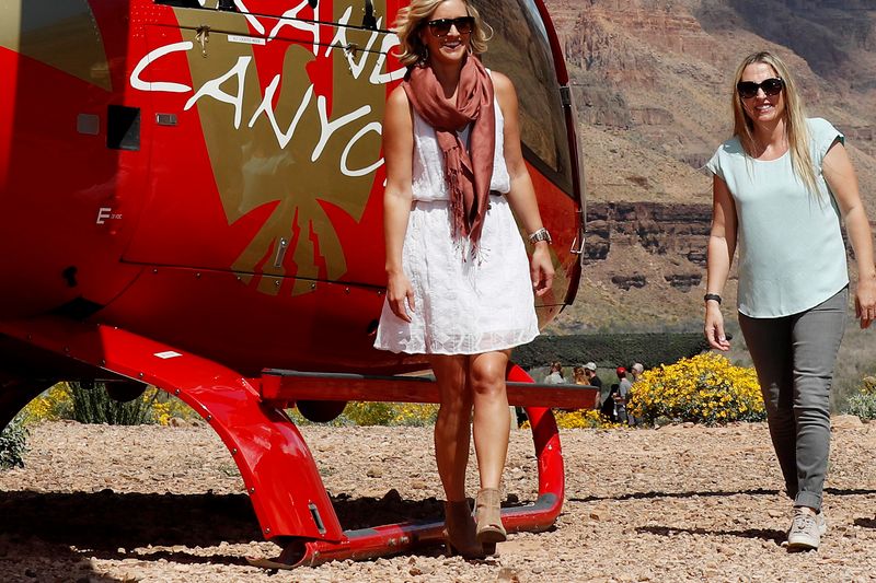 Private canyon floor landing with champagne