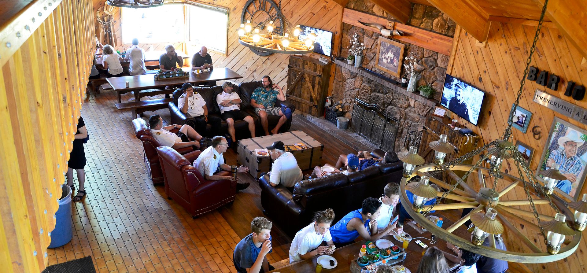 interior of the Bar 10 Ranch dining room where guests are seated eating food