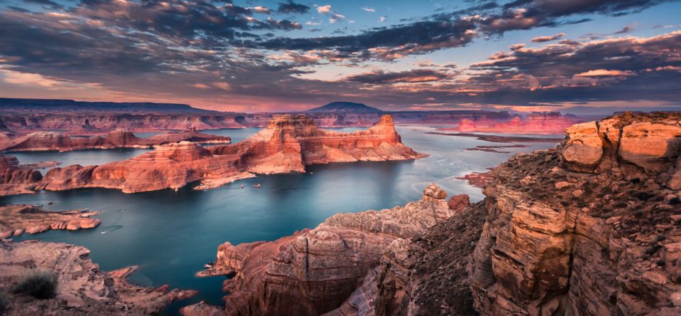 Sunset colors over the blue waters of Lake Powell in Page, Arizona