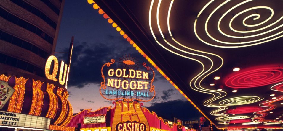 an exterior shot of the Golden Nugget Casino at night in Downtown Las Vegas