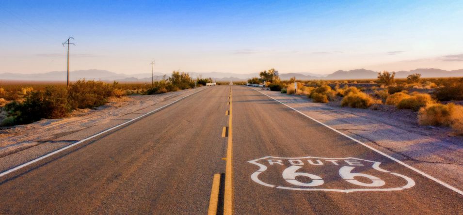 A segment of Route 66 cutting through a desert landscape