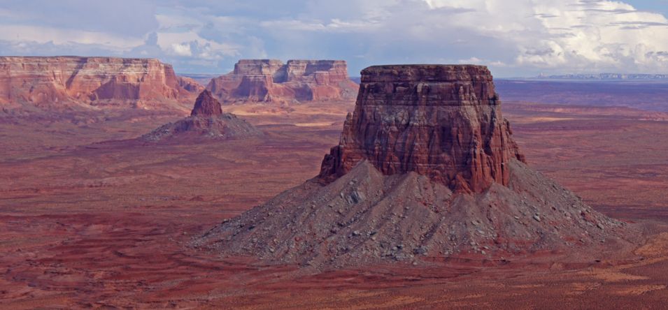 Tower Butte in Page, Arizona surrounded by red and orange desert landscape