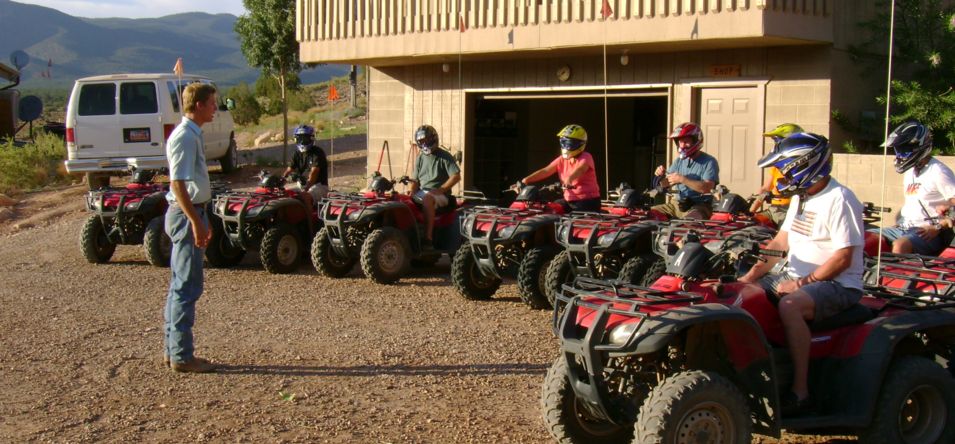 passengers receiving a safety brief before an ATV tour