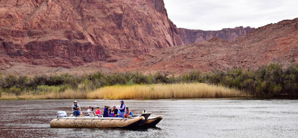people on a water boat on the colorado river