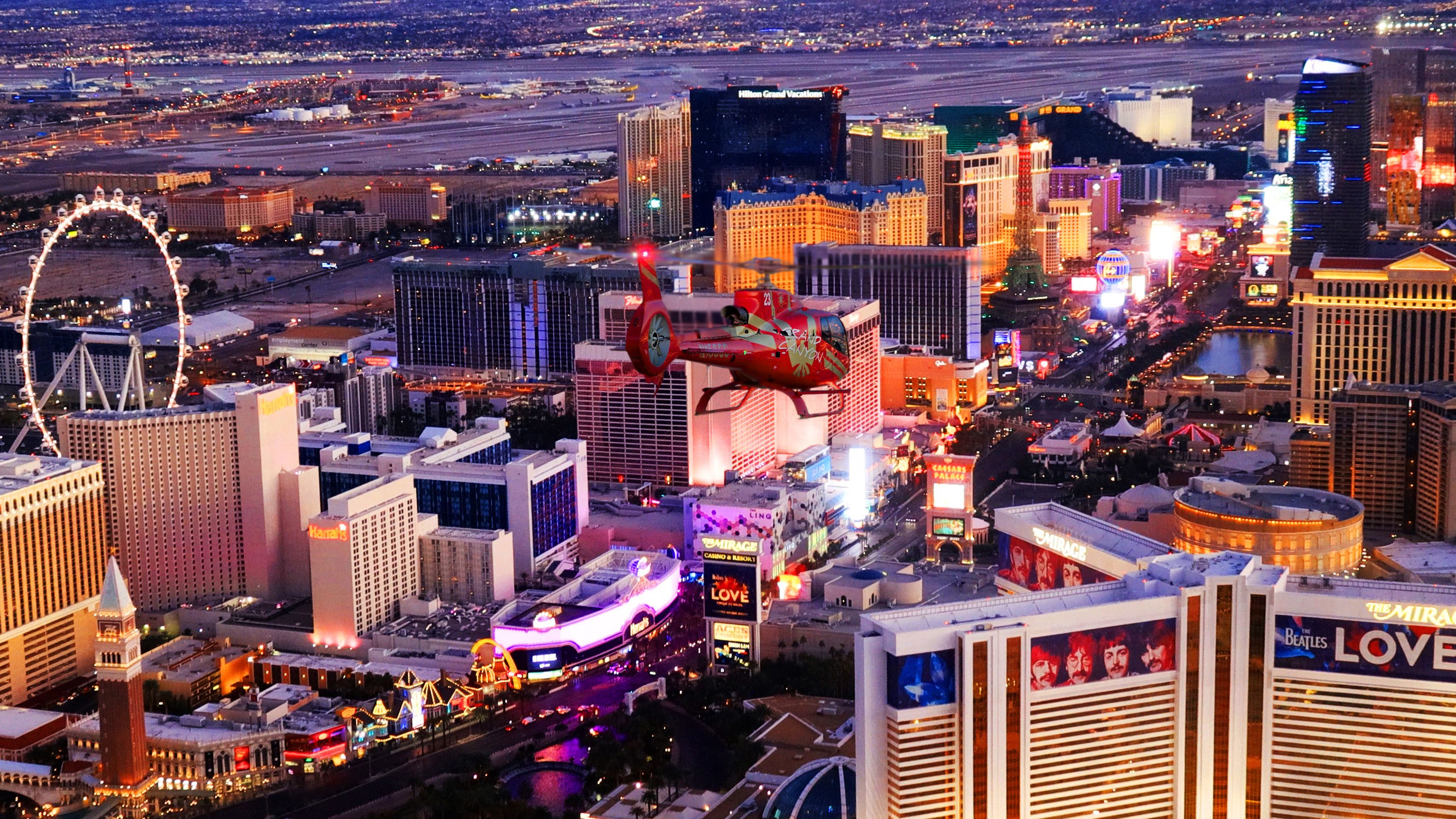an aerial view of a helicopter tour flying over the Las Vegas Strip casinos