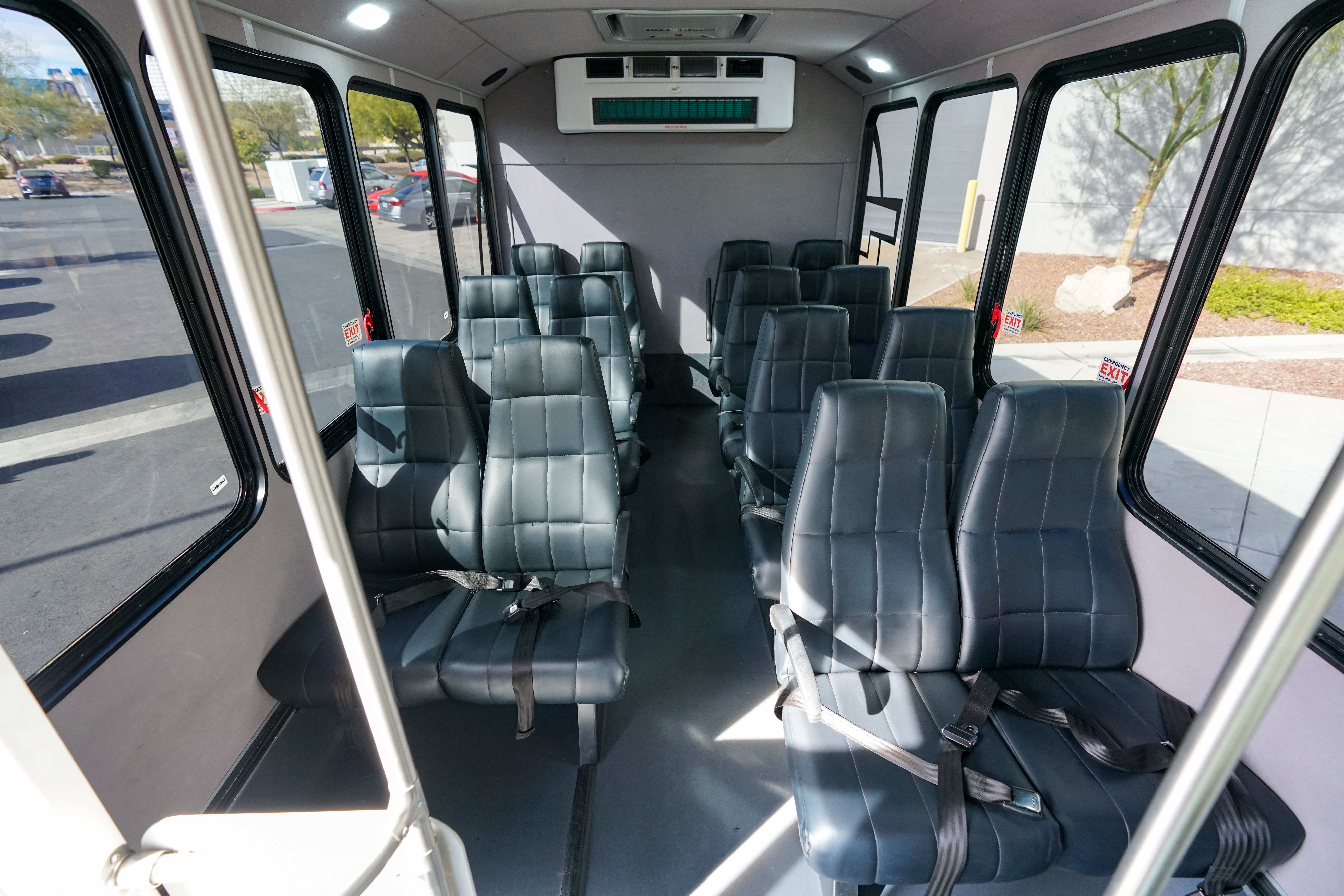 An interior view of a Papillon shuttle van used for roundtrip transportation to and from the air terminal